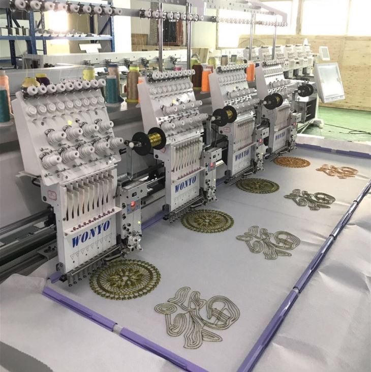 Machine à broder informatisée à 4 têtes